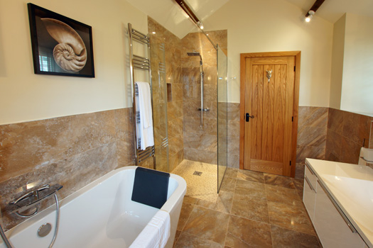 Large bathroom at The Dairy featuring a double-ended bath and walk-in shower