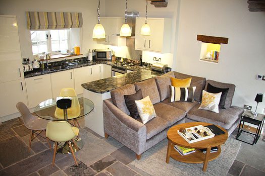 Well-equipped kitchen and dining space inside The Laundry